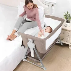 Cowiewie Baby Bassinet, Beside Sleeper for Baby Easy Folding Bedside Bassinet with Storage Basket and Wheels to Reduce Mom's Fatigue（Light Brown）